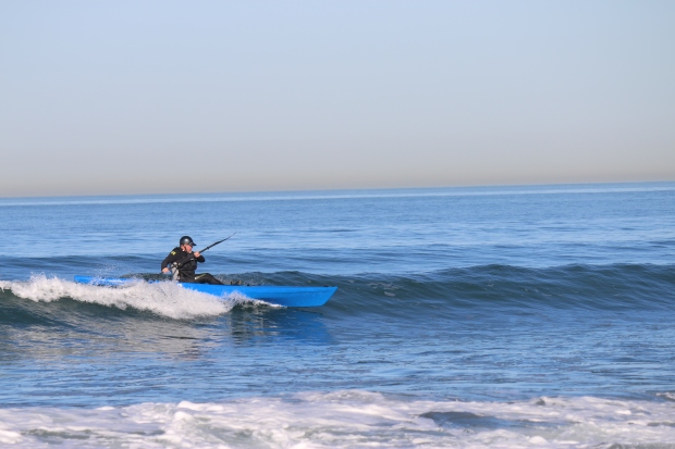 Jim getting his surf on.  This shot is of the prototype of a new boat out soon. hint hint.  